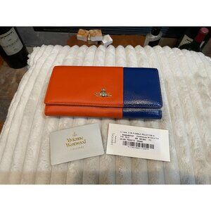 B313 -  All Inclusive Vivienne Westwood long bifold wallet in a bicolor orange a